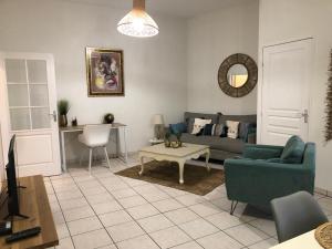 Posedenie v ubytovaní Bel appartement spacieux et lumineux hyper centre Blois