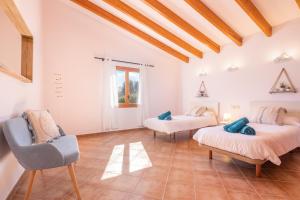 Posteľ alebo postele v izbe v ubytovaní Villa Marina de Namer By SunVillas Mallorca