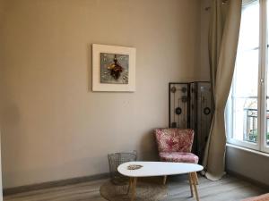 Posedenie v ubytovaní Bel appartement spacieux et lumineux hyper centre Blois