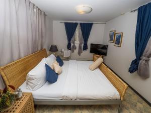 Postel nebo postele na pokoji v ubytování Hotel Rhyhof