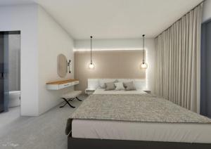 a bedroom with two beds and a desk and a bathroom at Atlantis Boutique City Hotel in Rhodes Town