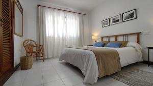 Postel nebo postele na pokoji v ubytování Casa Margarita