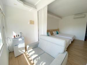 Letto o letti in una camera di 南鴻雅築South Home