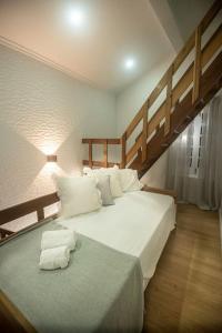 Katil atau katil-katil dalam bilik di Casa da Ribeira