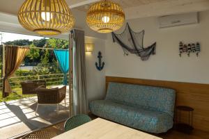 Гостиная зона в Lino delle Fate Eco Resort