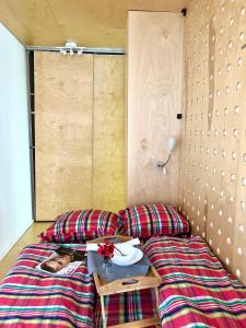 A bed or beds in a room at Flower house 5