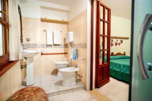 Ванная комната в AFFITTACAMERE SA BRATZA VACANZE