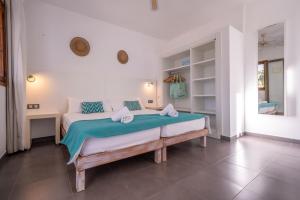 Posteľ alebo postele v izbe v ubytovaní Hostal Aigua Clara