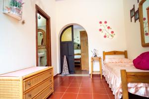 A bed or beds in a room at AFFITTACAMERE SA BRATZA VACANZE