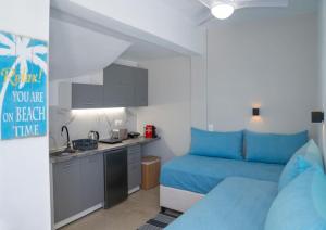 A kitchen or kitchenette at See the Sea 3