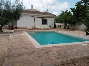 The swimming pool at or close to Villa Tres Cales