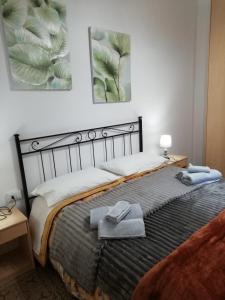 Ένα ή περισσότερα κρεβάτια σε δωμάτιο στο Casa Marina