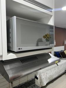 Η κουζίνα ή μικρή κουζίνα στο Ap mobiliado reg central de São Paulo +11 φωτογραφίες