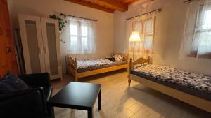 Postel nebo postele na pokoji v ubytování Apartmán Anička