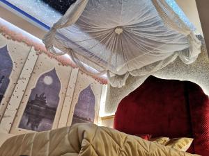 A bed or beds in a room at Suite Dreams Montecatini