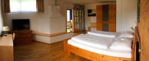 Postel nebo postele na pokoji v ubytování Kurhotel Bad Zell