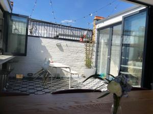 Μπαλκόνι ή βεράντα στο Stunning Richmond Maisionette with rooftop patio