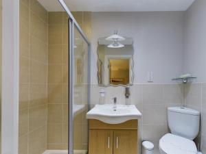 Ванная комната в The Beach House, Luxury Apartments