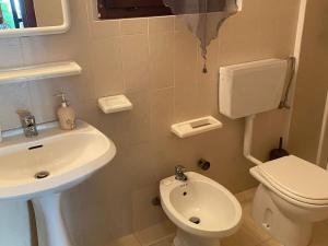 A bathroom at Apartment in Porto Pollo near Surf Paradise
