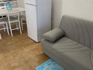 A seating area at Apartment in Porto Pollo near Surf Paradise