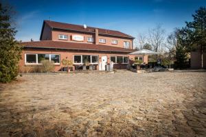 a large brick house with a large yard at Alte Bäckerei in Parchim