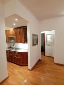 A kitchen or kitchenette at Gelsomino B&B Apartment