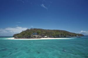 an island in the middle of the ocean at Bluewater Sumilon Island Resort in Sumilon Island