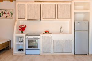 Kuchyň nebo kuchyňský kout v ubytování Bonzoe #3 + 15 fotografií