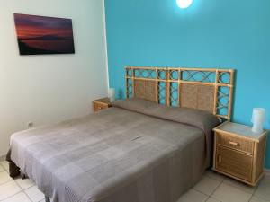 Ένα ή περισσότερα κρεβάτια σε δωμάτιο στο Hotel Il Triangolo