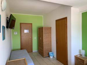 TV o dispositivi per l'intrattenimento presso Hotel Il Triangolo