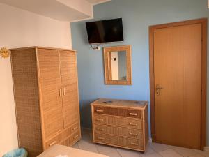 TV o dispositivi per l'intrattenimento presso Hotel Il Triangolo