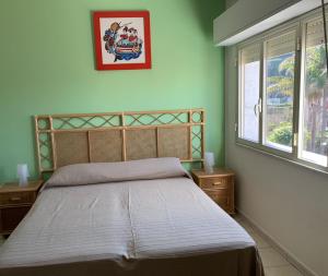 Letto o letti in una camera di Hotel Il Triangolo