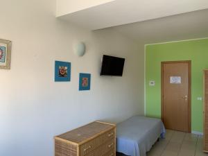 TV o dispositivi per l'intrattenimento presso Hotel Il Triangolo
