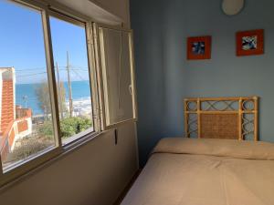 Letto o letti in una camera di Hotel Il Triangolo