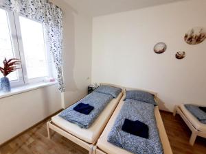 Posteľ alebo postele v izbe v ubytovaní Apartmán Anežka + 5 fotografií
