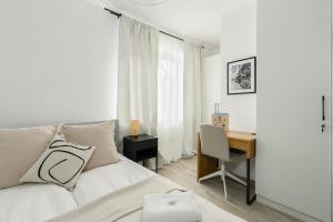 Postel nebo postele na pokoji v ubytování Calliera Charming Apartment Poznań by Renters