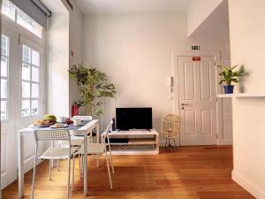 Телевизор и/или развлекательный центр в FX City Life by LovelyStay