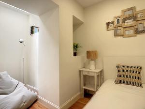 Кровать или кровати в номере FX City Life by LovelyStay