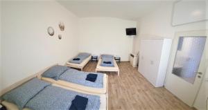 Posteľ alebo postele v izbe v ubytovaní Apartmán Anežka