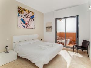 Posteľ alebo postele v izbe v ubytovaní ROCK BAY apartment with wonderful sea view and 5 minutes from the beach