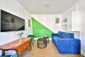 Televízia a/alebo spoločenská miestnosť v ubytovaní 41.Studio 2Pers#Sèvres-Lecourbe#Necker