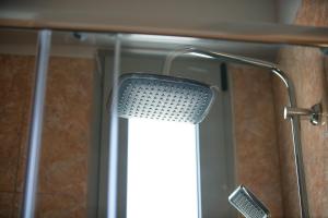 A bathroom at Evgoro Luxury Suites