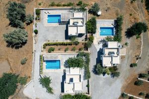The swimming pool at or close to Evgoro Luxury Suites
