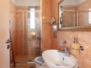 A bathroom at Evgoro Luxury Suites