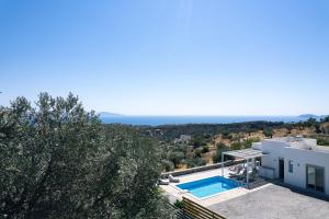 The swimming pool at or close to Evgoro Luxury Suites