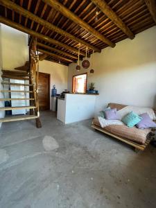 Giường trong phòng chung tại Chalé Lampião Caraiva