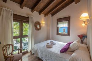 Postel nebo postele na pokoji v ubytování Casa de aldea el Toral