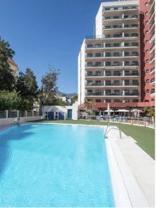 Basen w obiekcie 797 HOLIDAY RENTALS - ARCOSUR1- Moderno apartamento con terraza y vistas lub w pobliżu