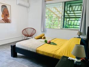 Cama o camas de una habitación en Gwada Natura Ecolodges & Spa