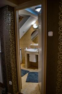 Kúpeľňa v ubytovaní Katyca Apartman